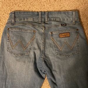 Wrangler Retro 29x 34”- mid rise- mid wash bootcut jeans